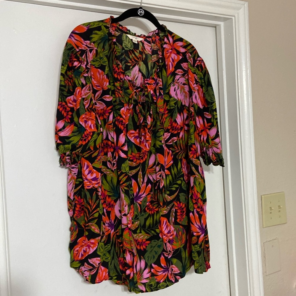 Woman’s pullover blouse with front bow.  Elastic arms